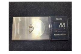 1390 ოქროს კულონი გული 0,58 ctw ბრილიანტებით